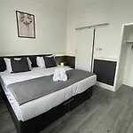 Pluxa Bearwood Hotel King Bedroom With Car Park